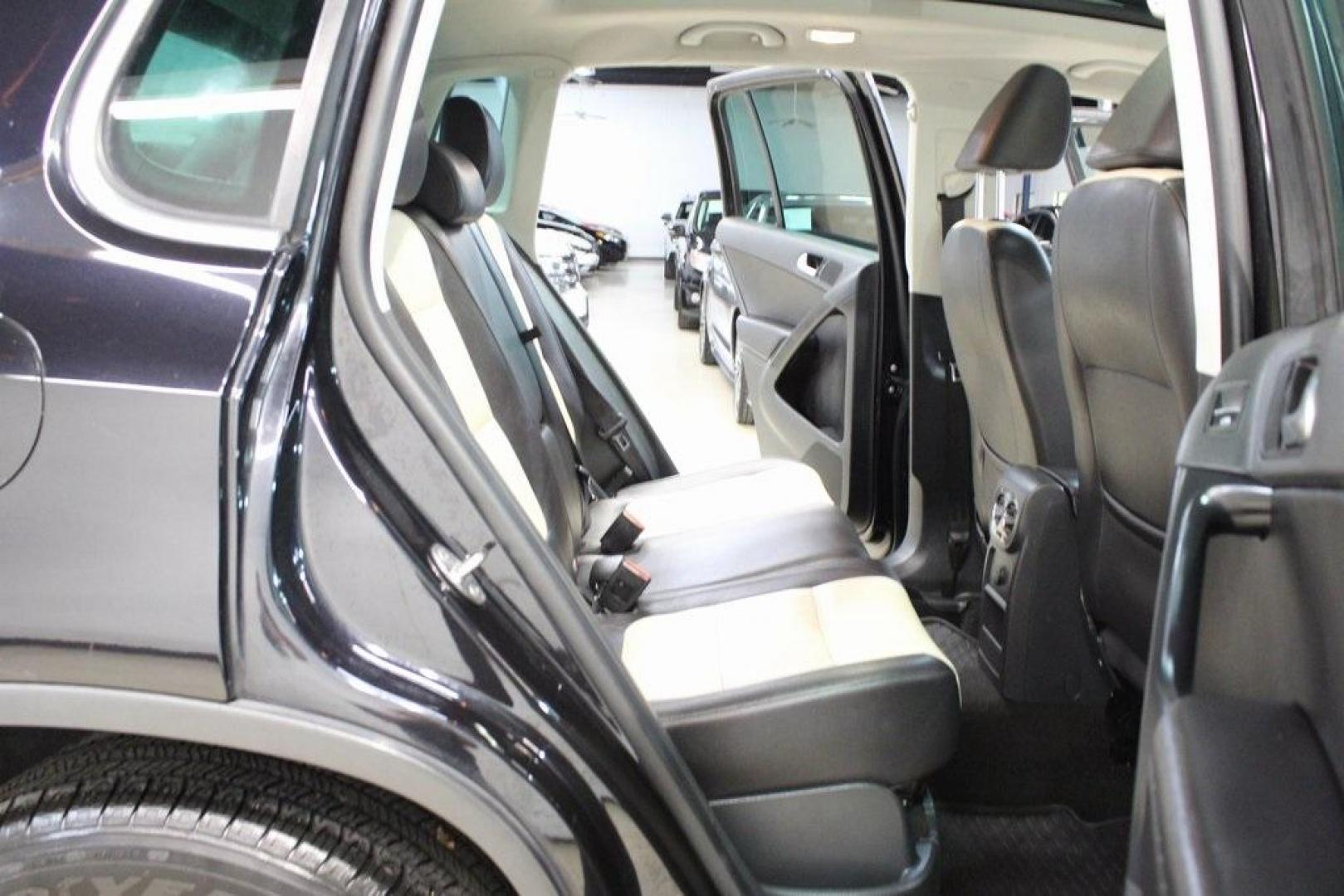 2017 Deep Black /Beige/Black Volkswagen Tiguan 2.0T Wolfsburg Edition (WVGRV7AX9HW) with an 2.0L TSI DOHC engine, Automatic transmission, located at 15300 Midway Rd., Addison, TX, 75001, (972) 702-0011, 32.958321, -96.838074 - Photo#16