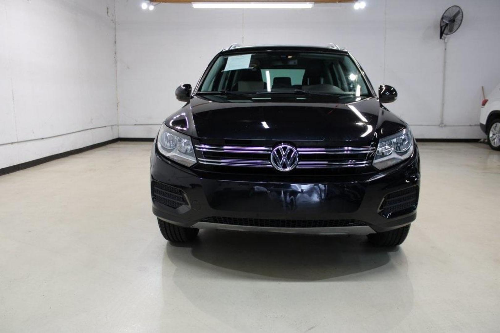 2017 Deep Black /Beige/Black Volkswagen Tiguan 2.0T Wolfsburg Edition (WVGRV7AX9HW) with an 2.0L TSI DOHC engine, Automatic transmission, located at 15300 Midway Rd., Addison, TX, 75001, (972) 702-0011, 32.958321, -96.838074 - Photo#5
