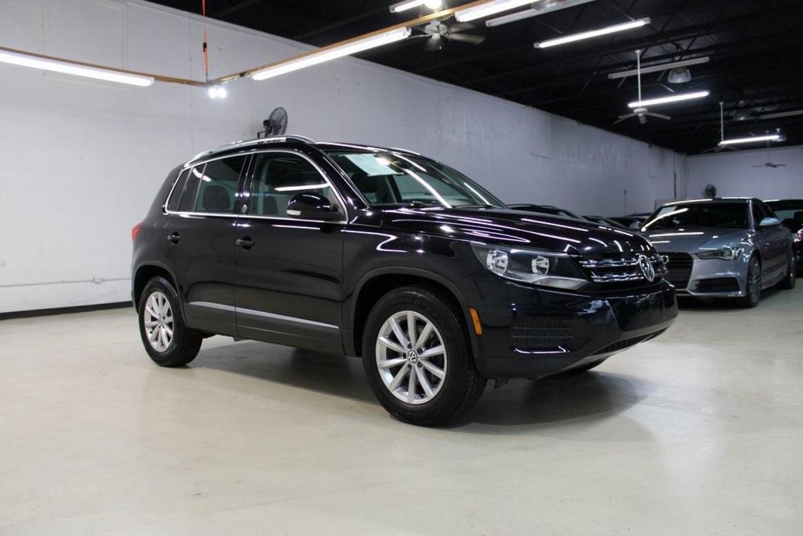 2017 Deep Black /Beige/Black Volkswagen Tiguan 2.0T Wolfsburg Edition (WVGRV7AX9HW) with an 2.0L TSI DOHC engine, Automatic transmission, located at 15300 Midway Rd., Addison, TX, 75001, (972) 702-0011, 32.958321, -96.838074 - Photo#6