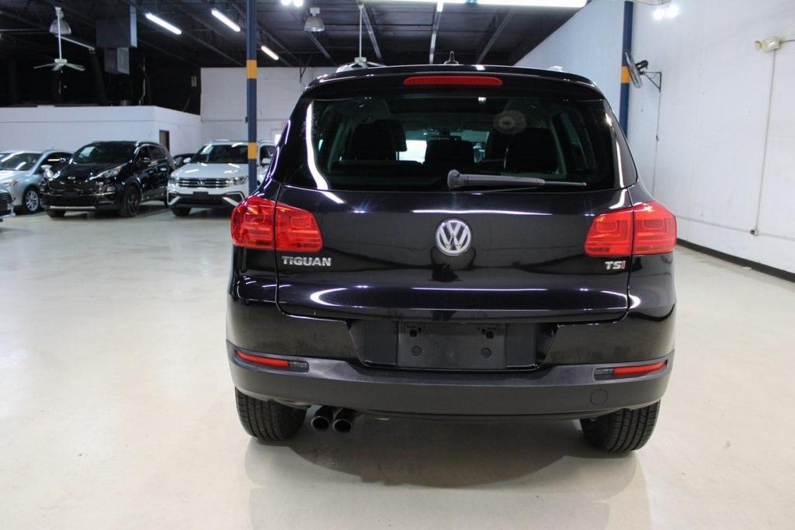 2017 Deep Black /Beige/Black Volkswagen Tiguan 2.0T Wolfsburg Edition (WVGRV7AX9HW) with an 2.0L TSI DOHC engine, Automatic transmission, located at 15300 Midway Rd., Addison, TX, 75001, (972) 702-0011, 32.958321, -96.838074 - Photo#7