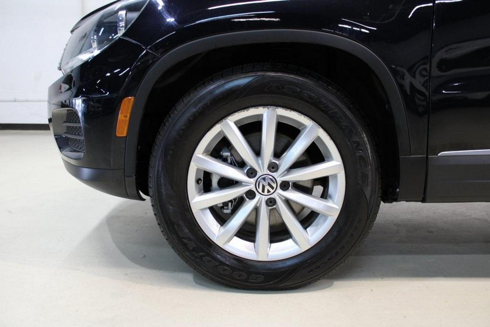 2017 Deep Black /Beige/Black Volkswagen Tiguan 2.0T Wolfsburg Edition (WVGRV7AX9HW) with an 2.0L TSI DOHC engine, Automatic transmission, located at 15300 Midway Rd., Addison, TX, 75001, (972) 702-0011, 32.958321, -96.838074 - Photo#8