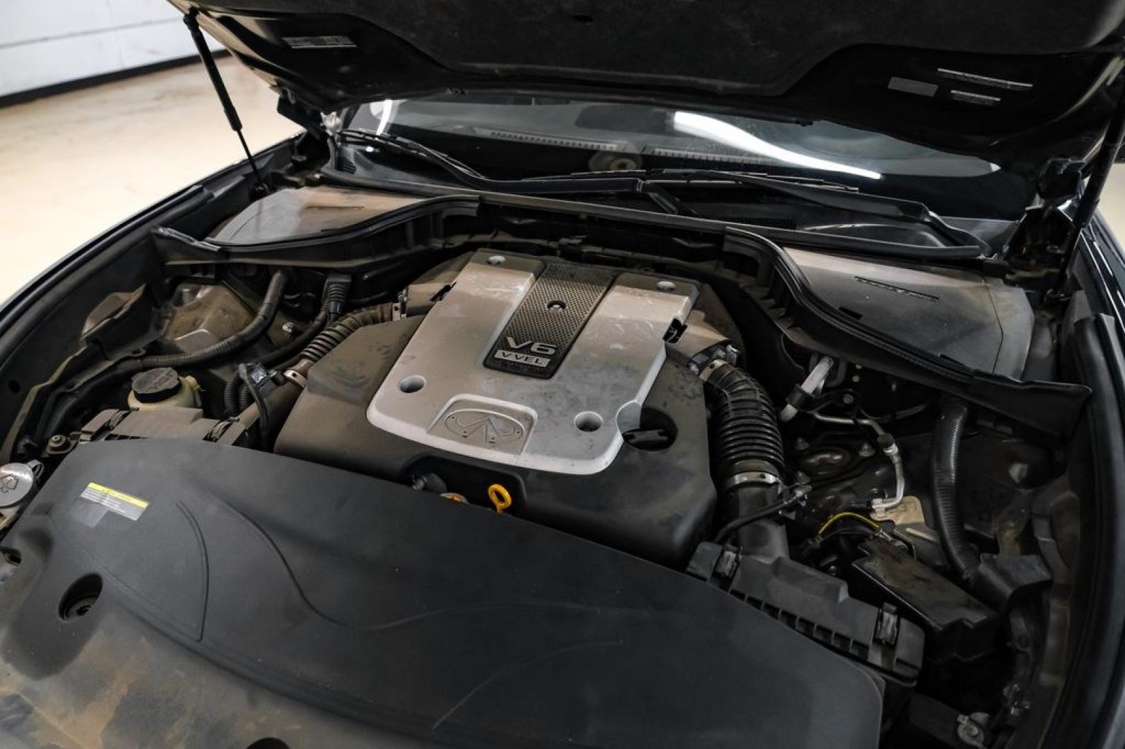2019 Black Obsidian /Graphite INFINITI Q70L 3.7 (JN1BY1PP7KM) with an 3.7L V6 DOHC 24V VVEL engine, Automatic transmission, located at 15300 Midway Rd., Addison, TX, 75001, (972) 702-0011, 32.958321, -96.838074- Photo#48