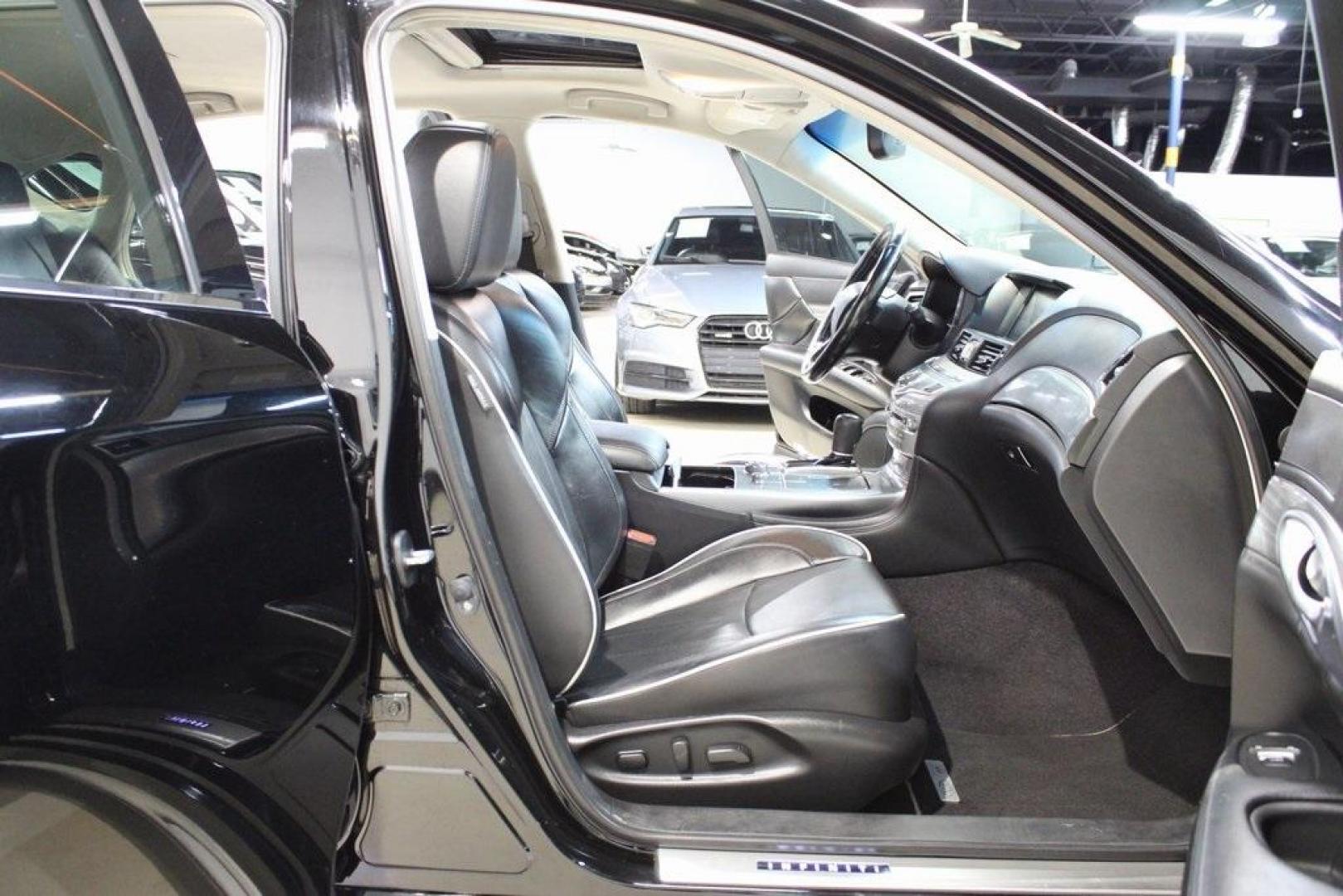 2019 Black Obsidian /Graphite INFINITI Q70L 3.7 (JN1BY1PP7KM) with an 3.7L V6 DOHC 24V VVEL engine, Automatic transmission, located at 15300 Midway Rd., Addison, TX, 75001, (972) 702-0011, 32.958321, -96.838074 - Introducing the 2019 INFINITI Q70 3.7 LUXE AWD, now available at Midway Auto Group in Addison, Texas. This sophisticated sedan seamlessly blends performance, luxury, and advanced technology, offering an exceptional driving experience for discerning motorists.<br><br>Key Features:<br><br>Engine: 3.7- - Photo#14