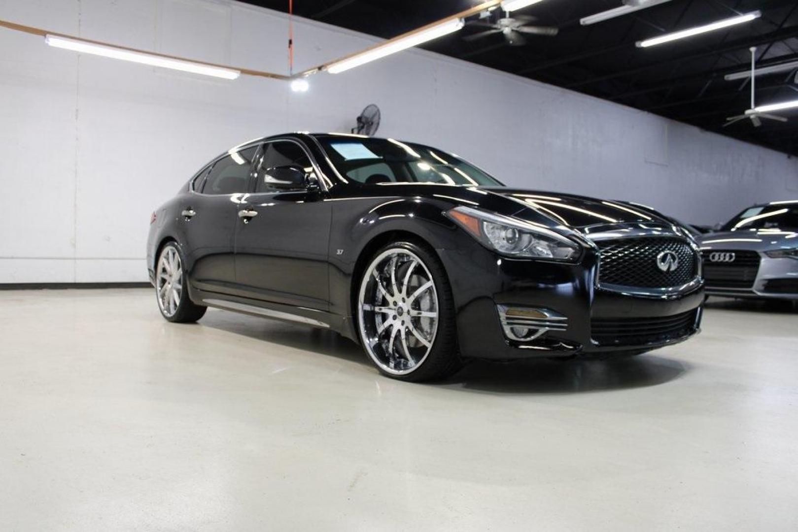 2019 Black Obsidian /Graphite INFINITI Q70L 3.7 (JN1BY1PP7KM) with an 3.7L V6 DOHC 24V VVEL engine, Automatic transmission, located at 15300 Midway Rd., Addison, TX, 75001, (972) 702-0011, 32.958321, -96.838074 - Introducing the 2019 INFINITI Q70 3.7 LUXE AWD, now available at Midway Auto Group in Addison, Texas. This sophisticated sedan seamlessly blends performance, luxury, and advanced technology, offering an exceptional driving experience for discerning motorists.<br><br>Key Features:<br><br>Engine: 3.7- - Photo#1