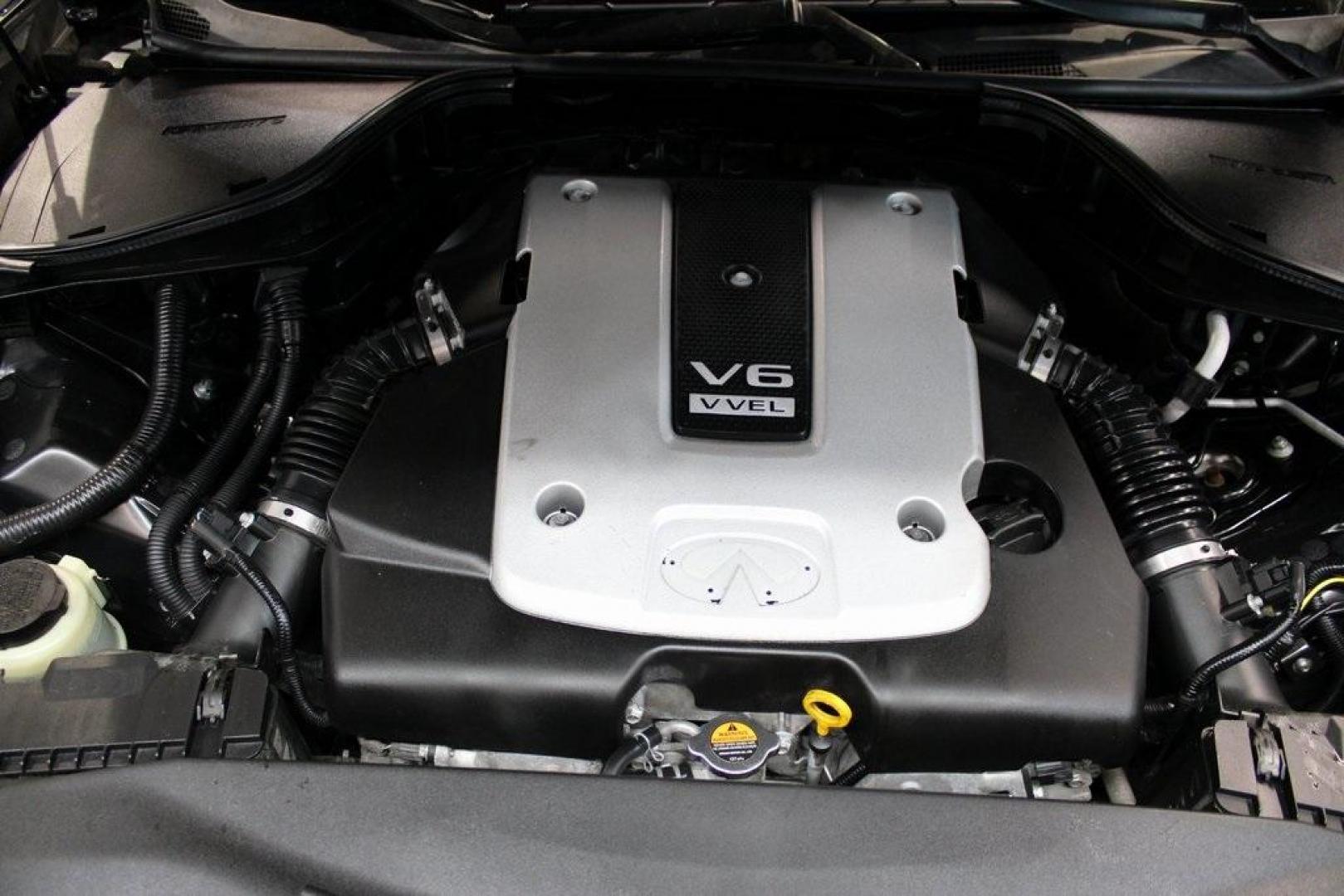 2019 Black Obsidian /Graphite INFINITI Q70L 3.7 (JN1BY1PP7KM) with an 3.7L V6 DOHC 24V VVEL engine, Automatic transmission, located at 15300 Midway Rd., Addison, TX, 75001, (972) 702-0011, 32.958321, -96.838074 - Introducing the 2019 INFINITI Q70 3.7 LUXE AWD, now available at Midway Auto Group in Addison, Texas. This sophisticated sedan seamlessly blends performance, luxury, and advanced technology, offering an exceptional driving experience for discerning motorists.<br><br>Key Features:<br><br>Engine: 3.7- - Photo#29