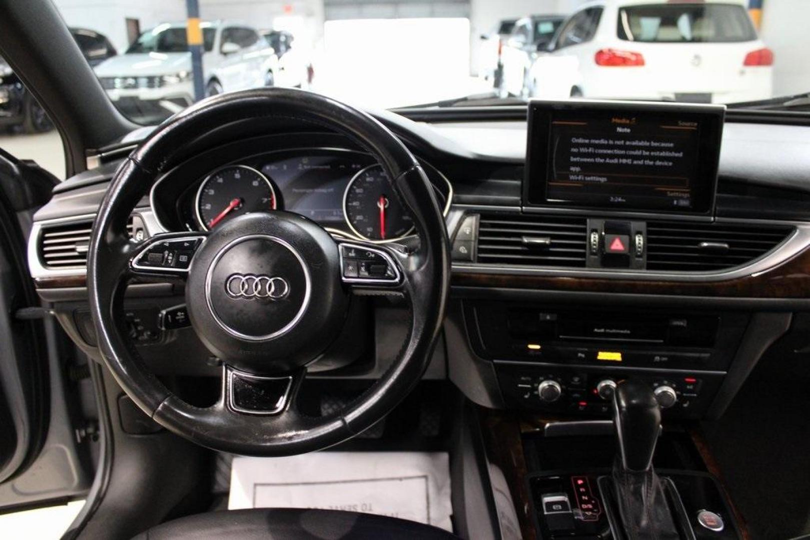 2016 Florett Silver Metallic Audi A6 2.0T Premium (WAUFFAFC0GN) with an 2.0L 4-Cylinder TFSI engine, Automatic transmission, located at 15300 Midway Rd., Addison, TX, 75001, (972) 702-0011, 32.958321, -96.838074 - Photo#17