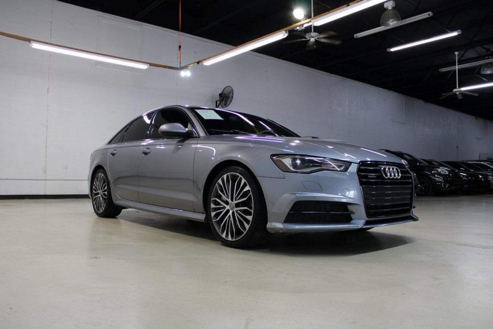 2016 Florett Silver Metallic Audi A6 2.0T Premium (WAUFFAFC0GN) with an 2.0L 4-Cylinder TFSI engine, Automatic transmission, located at 15300 Midway Rd., Addison, TX, 75001, (972) 702-0011, 32.958321, -96.838074 - Photo#1