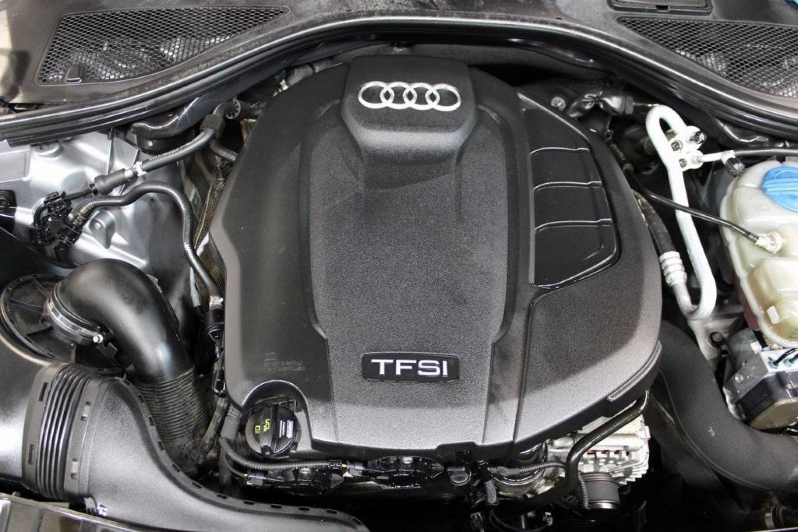 2016 Florett Silver Metallic Audi A6 2.0T Premium (WAUFFAFC0GN) with an 2.0L 4-Cylinder TFSI engine, Automatic transmission, located at 15300 Midway Rd., Addison, TX, 75001, (972) 702-0011, 32.958321, -96.838074 - Photo#32