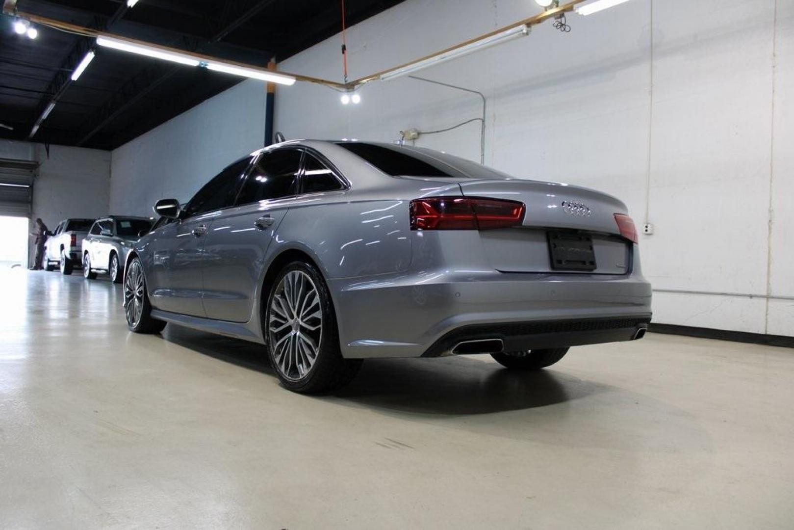 2016 Florett Silver Metallic Audi A6 2.0T Premium (WAUFFAFC0GN) with an 2.0L 4-Cylinder TFSI engine, Automatic transmission, located at 15300 Midway Rd., Addison, TX, 75001, (972) 702-0011, 32.958321, -96.838074 - Photo#3