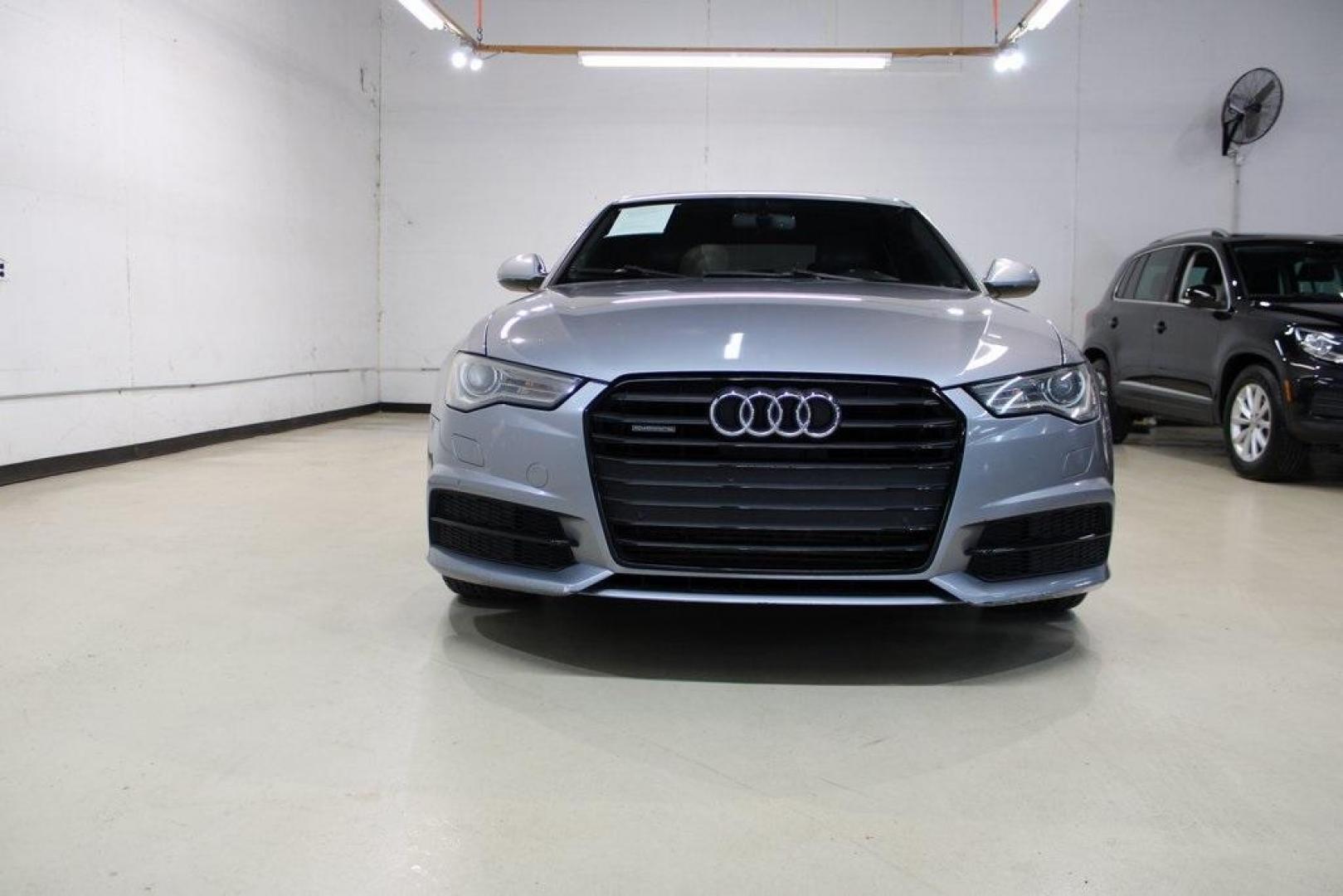 2016 Florett Silver Metallic Audi A6 2.0T Premium (WAUFFAFC0GN) with an 2.0L 4-Cylinder TFSI engine, Automatic transmission, located at 15300 Midway Rd., Addison, TX, 75001, (972) 702-0011, 32.958321, -96.838074 - Photo#5