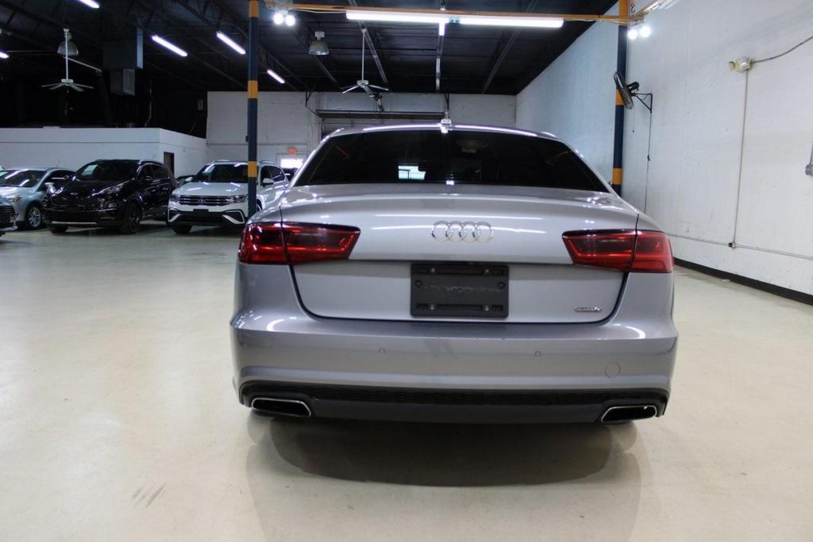 2016 Florett Silver Metallic Audi A6 2.0T Premium (WAUFFAFC0GN) with an 2.0L 4-Cylinder TFSI engine, Automatic transmission, located at 15300 Midway Rd., Addison, TX, 75001, (972) 702-0011, 32.958321, -96.838074 - Photo#7