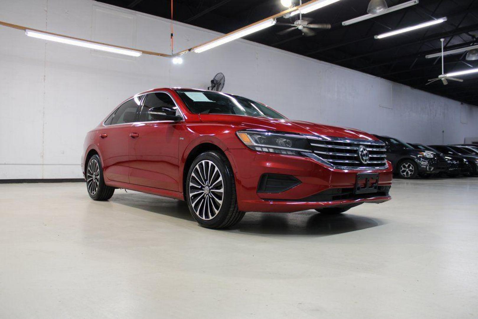 2022 Red Metallic /Black Volkswagen Passat 2.0T Limited Edition (1VWBA7A37NC) with an 2.0L I4 TSI Turbocharged engine, Automatic transmission, located at 15300 Midway Rd., Addison, TX, 75001, (972) 702-0011, 32.958321, -96.838074 - Introducing the 2022 Volkswagen Passat SE, now available at Midway Auto Group in Addison, Texas. This midsize sedan seamlessly blends performance, comfort, and advanced technology, making it an excellent choice for discerning drivers seeking a reliable and stylish vehicle.<br><br>Key Features:<br><b - Photo#1