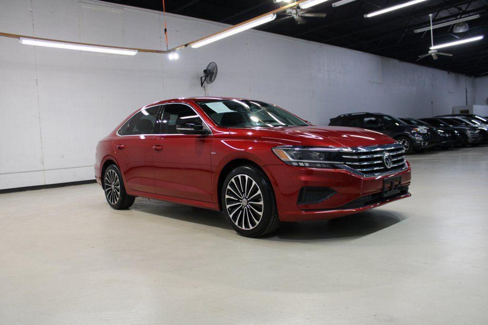 2022 Red Metallic /Black Volkswagen Passat 2.0T Limited Edition (1VWBA7A37NC) with an 2.0L I4 TSI Turbocharged engine, Automatic transmission, located at 15300 Midway Rd., Addison, TX, 75001, (972) 702-0011, 32.958321, -96.838074 - Introducing the 2022 Volkswagen Passat SE, now available at Midway Auto Group in Addison, Texas. This midsize sedan seamlessly blends performance, comfort, and advanced technology, making it an excellent choice for discerning drivers seeking a reliable and stylish vehicle.<br><br>Key Features:<br><b - Photo#6