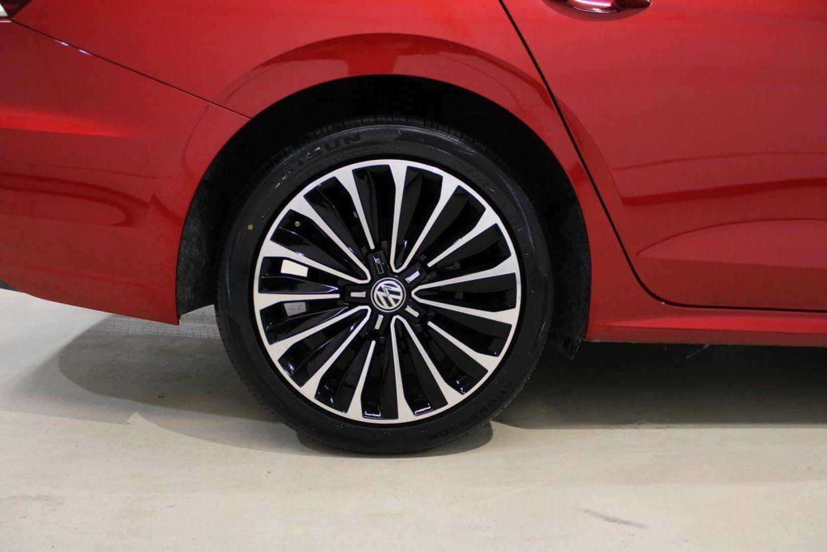 2022 Red Metallic /Black Volkswagen Passat 2.0T Limited Edition (1VWBA7A37NC) with an 2.0L I4 TSI Turbocharged engine, Automatic transmission, located at 15300 Midway Rd., Addison, TX, 75001, (972) 702-0011, 32.958321, -96.838074 - Introducing the 2022 Volkswagen Passat SE, now available at Midway Auto Group in Addison, Texas. This midsize sedan seamlessly blends performance, comfort, and advanced technology, making it an excellent choice for discerning drivers seeking a reliable and stylish vehicle.<br><br>Key Features:<br><b - Photo#12