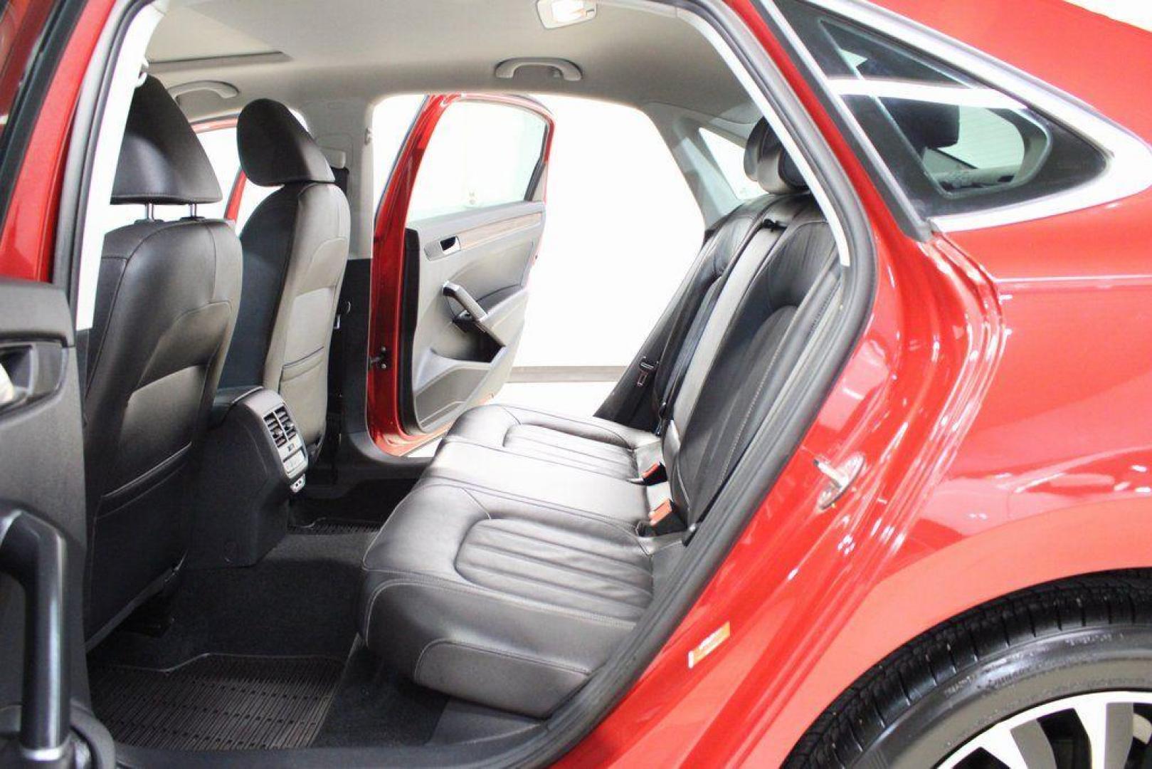 2022 Red Metallic /Black Volkswagen Passat 2.0T Limited Edition (1VWBA7A37NC) with an 2.0L I4 TSI Turbocharged engine, Automatic transmission, located at 15300 Midway Rd., Addison, TX, 75001, (972) 702-0011, 32.958321, -96.838074 - Introducing the 2022 Volkswagen Passat SE, now available at Midway Auto Group in Addison, Texas. This midsize sedan seamlessly blends performance, comfort, and advanced technology, making it an excellent choice for discerning drivers seeking a reliable and stylish vehicle.<br><br>Key Features:<br><b - Photo#18