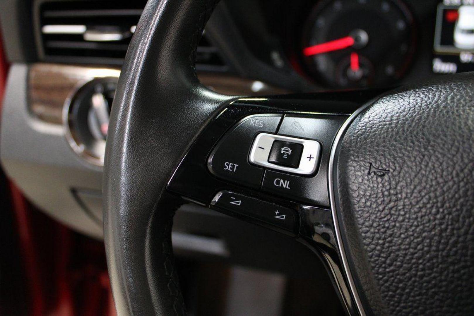 2022 Red Metallic /Black Volkswagen Passat 2.0T Limited Edition (1VWBA7A37NC) with an 2.0L I4 TSI Turbocharged engine, Automatic transmission, located at 15300 Midway Rd., Addison, TX, 75001, (972) 702-0011, 32.958321, -96.838074 - Introducing the 2022 Volkswagen Passat SE, now available at Midway Auto Group in Addison, Texas. This midsize sedan seamlessly blends performance, comfort, and advanced technology, making it an excellent choice for discerning drivers seeking a reliable and stylish vehicle.<br><br>Key Features:<br><b - Photo#24