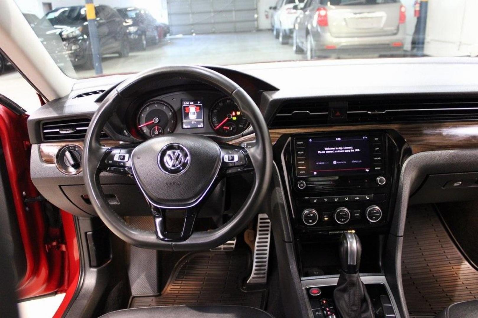 2022 Red Metallic /Black Volkswagen Passat 2.0T Limited Edition (1VWBA7A37NC) with an 2.0L I4 TSI Turbocharged engine, Automatic transmission, located at 15300 Midway Rd., Addison, TX, 75001, (972) 702-0011, 32.958321, -96.838074 - Introducing the 2022 Volkswagen Passat SE, now available at Midway Auto Group in Addison, Texas. This midsize sedan seamlessly blends performance, comfort, and advanced technology, making it an excellent choice for discerning drivers seeking a reliable and stylish vehicle.<br><br>Key Features:<br><b - Photo#19