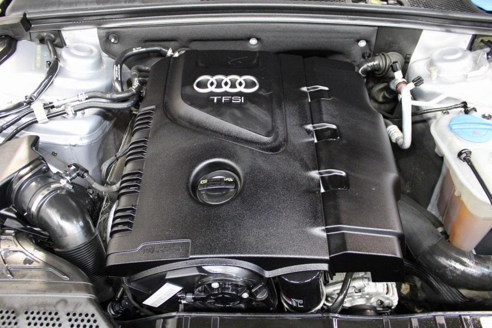2016 Florett Silver Metallic Audi A4 2.0T Premium (WAUAFAFL7GN) with an 2.0L 4-Cylinder TFSI DOHC engine, CVT transmission, located at 15300 Midway Rd., Addison, TX, 75001, (972) 702-0011, 32.958321, -96.838074 - Photo#28