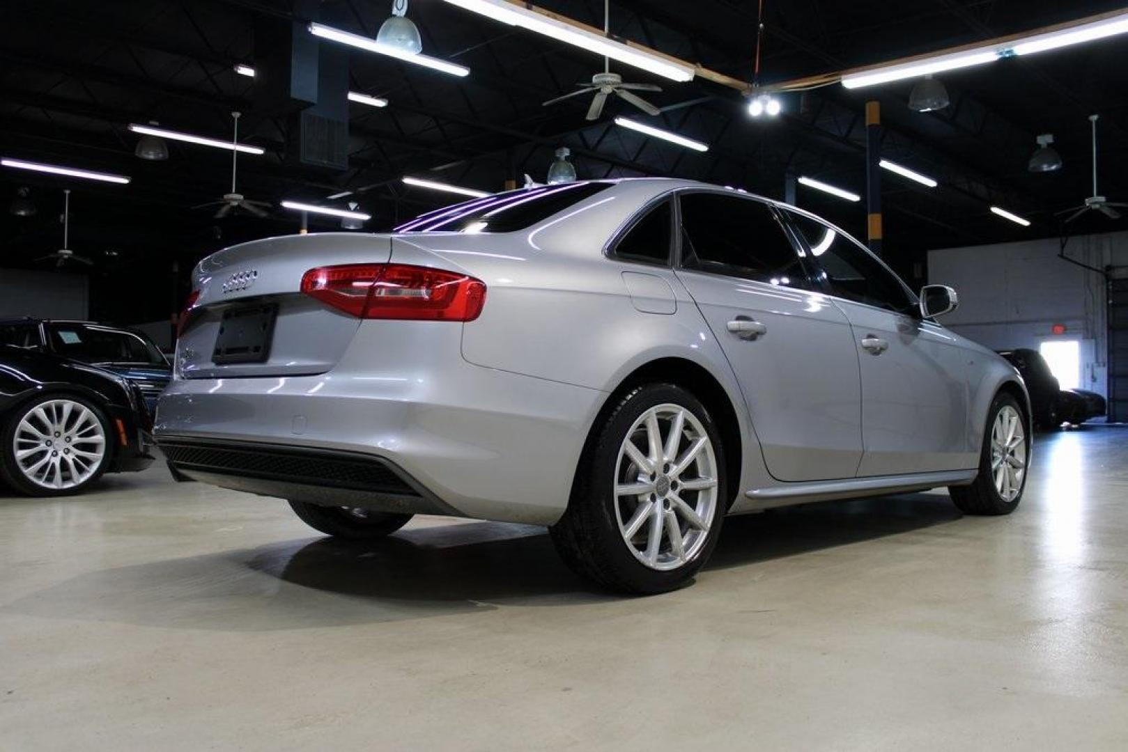 2016 Florett Silver Metallic Audi A4 2.0T Premium (WAUAFAFL7GN) with an 2.0L 4-Cylinder TFSI DOHC engine, CVT transmission, located at 15300 Midway Rd., Addison, TX, 75001, (972) 702-0011, 32.958321, -96.838074 - Photo#2