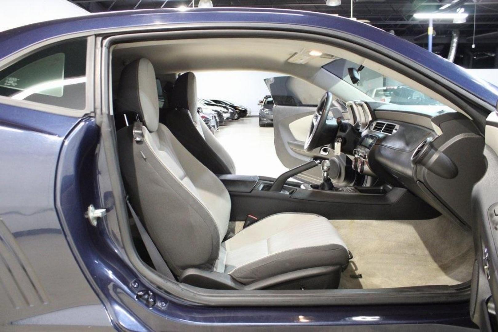 2015 Blue Velvet Metallic /Gray Chevrolet Camaro 1LS (2G1FA1E32F9) with an 3.6L V6 DGI DOHC VVT engine, Manual transmission, located at 15300 Midway Rd., Addison, TX, 75001, (972) 702-0011, 32.958321, -96.838074 - Unleash your inner driver with the 2015 Chevrolet Camaro 1LS Coupe, now available at Midway Auto Group in Addison, Texas. This iconic muscle car combines classic design with modern performance, offering an exhilarating driving experience that's hard to match.<br><br>Key Features:<br><br>Engine: 3.6L - Photo#13