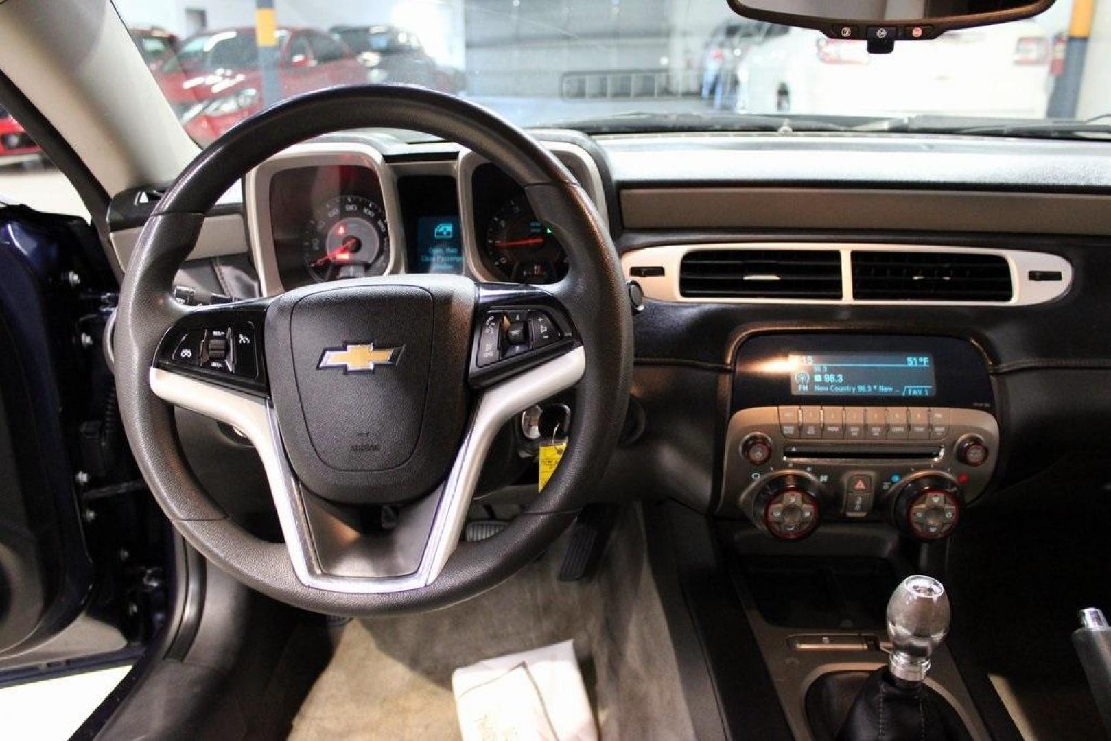 2015 Blue Velvet Metallic /Gray Chevrolet Camaro 1LS (2G1FA1E32F9) with an 3.6L V6 DGI DOHC VVT engine, Manual transmission, located at 15300 Midway Rd., Addison, TX, 75001, (972) 702-0011, 32.958321, -96.838074 - Unleash your inner driver with the 2015 Chevrolet Camaro 1LS Coupe, now available at Midway Auto Group in Addison, Texas. This iconic muscle car combines classic design with modern performance, offering an exhilarating driving experience that's hard to match.<br><br>Key Features:<br><br>Engine: 3.6L - Photo#15