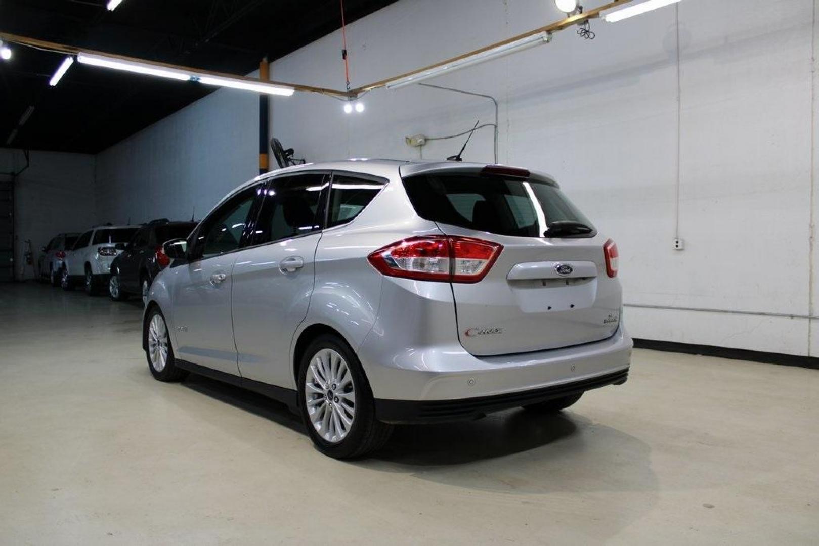 2018 Ingot Silver /Charcoal Black Ford C-Max Hybrid SE (1FADP5AU1JL) with an I4 Hybrid engine, CVT transmission, located at 15300 Midway Rd., Addison, TX, 75001, (972) 702-0011, 32.958321, -96.838074 - Photo#3