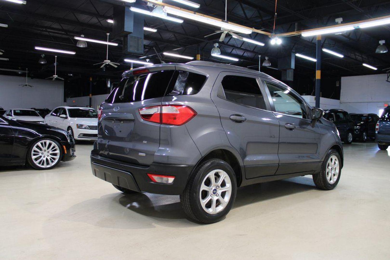 2019 Smoke /Ebony Black Ford EcoSport SE (MAJ3S2GE4KC) with an EcoBoost 1.0L I3 GTDi DOHC Turbocharged VCT engine, Automatic transmission, located at 15300 Midway Rd., Addison, TX, 75001, (972) 702-0011, 32.958321, -96.838074 - HOME OF THE NO HAGGLE PRICE - WHOLESALE PRICES TO THE PUBLIC!!<br><br>Smoke 2019 Ford EcoSport SE<br><br>27/29 City/Highway MPG<br><br><br>At Midway Auto Group, we strive to provide you with the best quality vehicles for the lowest possible price, and this 2019 Ford EcoSport is no exception,We finan - Photo#2