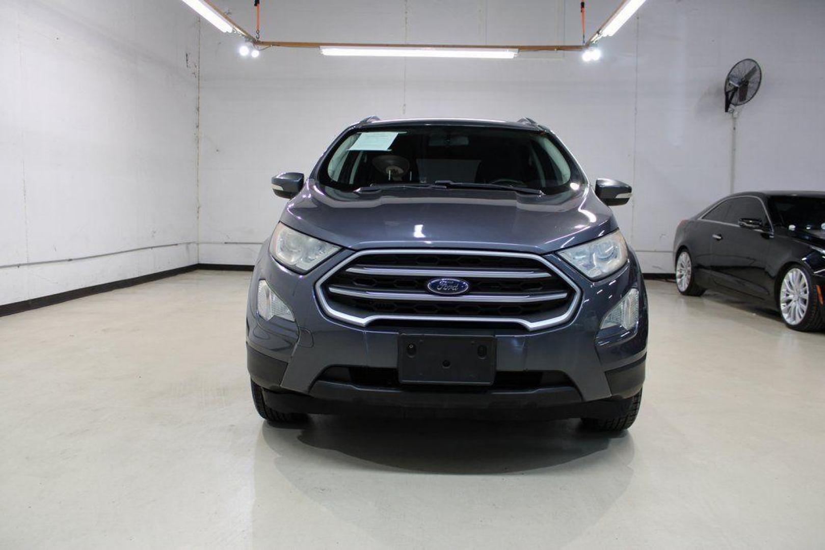 2019 Smoke /Ebony Black Ford EcoSport SE (MAJ3S2GE4KC) with an EcoBoost 1.0L I3 GTDi DOHC Turbocharged VCT engine, Automatic transmission, located at 15300 Midway Rd., Addison, TX, 75001, (972) 702-0011, 32.958321, -96.838074 - HOME OF THE NO HAGGLE PRICE - WHOLESALE PRICES TO THE PUBLIC!!<br><br>Smoke 2019 Ford EcoSport SE<br><br>27/29 City/Highway MPG<br><br><br>At Midway Auto Group, we strive to provide you with the best quality vehicles for the lowest possible price, and this 2019 Ford EcoSport is no exception,We finan - Photo#5