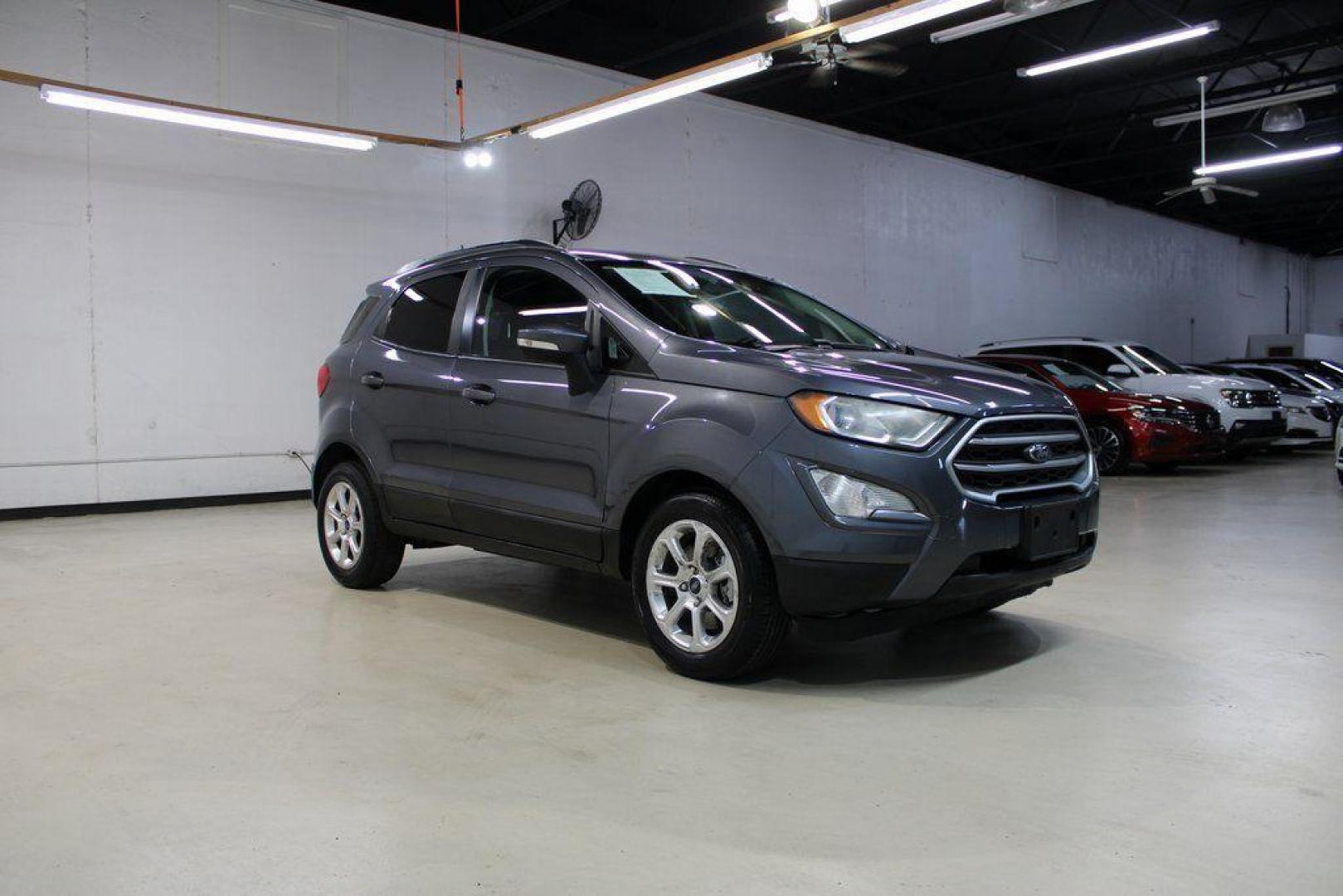 2019 Smoke /Ebony Black Ford EcoSport SE (MAJ3S2GE4KC) with an EcoBoost 1.0L I3 GTDi DOHC Turbocharged VCT engine, Automatic transmission, located at 15300 Midway Rd., Addison, TX, 75001, (972) 702-0011, 32.958321, -96.838074 - HOME OF THE NO HAGGLE PRICE - WHOLESALE PRICES TO THE PUBLIC!!<br><br>Smoke 2019 Ford EcoSport SE<br><br>27/29 City/Highway MPG<br><br><br>At Midway Auto Group, we strive to provide you with the best quality vehicles for the lowest possible price, and this 2019 Ford EcoSport is no exception,We finan - Photo#6
