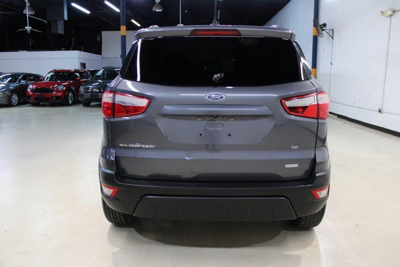 2019 Smoke /Ebony Black Ford EcoSport SE (MAJ3S2GE4KC) with an EcoBoost 1.0L I3 GTDi DOHC Turbocharged VCT engine, Automatic transmission, located at 15300 Midway Rd., Addison, TX, 75001, (972) 702-0011, 32.958321, -96.838074 - HOME OF THE NO HAGGLE PRICE - WHOLESALE PRICES TO THE PUBLIC!!<br><br>Smoke 2019 Ford EcoSport SE<br><br>27/29 City/Highway MPG<br><br><br>At Midway Auto Group, we strive to provide you with the best quality vehicles for the lowest possible price, and this 2019 Ford EcoSport is no exception,We finan - Photo#7