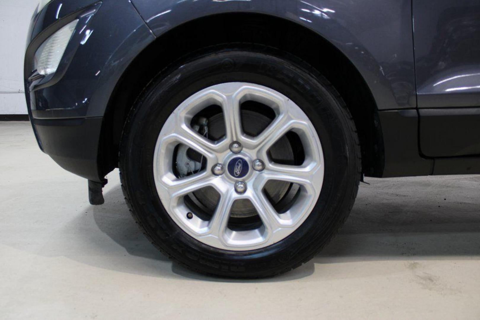 2019 Smoke /Ebony Black Ford EcoSport SE (MAJ3S2GE4KC) with an EcoBoost 1.0L I3 GTDi DOHC Turbocharged VCT engine, Automatic transmission, located at 15300 Midway Rd., Addison, TX, 75001, (972) 702-0011, 32.958321, -96.838074 - HOME OF THE NO HAGGLE PRICE - WHOLESALE PRICES TO THE PUBLIC!!<br><br>Smoke 2019 Ford EcoSport SE<br><br>27/29 City/Highway MPG<br><br><br>At Midway Auto Group, we strive to provide you with the best quality vehicles for the lowest possible price, and this 2019 Ford EcoSport is no exception,We finan - Photo#8