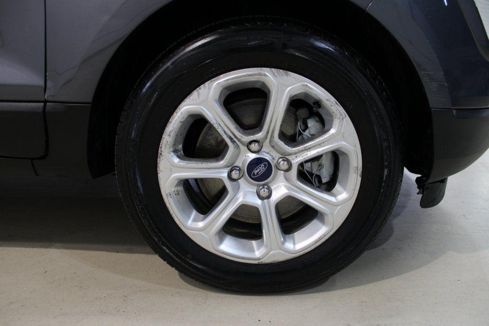 2019 Smoke /Ebony Black Ford EcoSport SE (MAJ3S2GE4KC) with an EcoBoost 1.0L I3 GTDi DOHC Turbocharged VCT engine, Automatic transmission, located at 15300 Midway Rd., Addison, TX, 75001, (972) 702-0011, 32.958321, -96.838074 - HOME OF THE NO HAGGLE PRICE - WHOLESALE PRICES TO THE PUBLIC!!<br><br>Smoke 2019 Ford EcoSport SE<br><br>27/29 City/Highway MPG<br><br><br>At Midway Auto Group, we strive to provide you with the best quality vehicles for the lowest possible price, and this 2019 Ford EcoSport is no exception,We finan - Photo#11