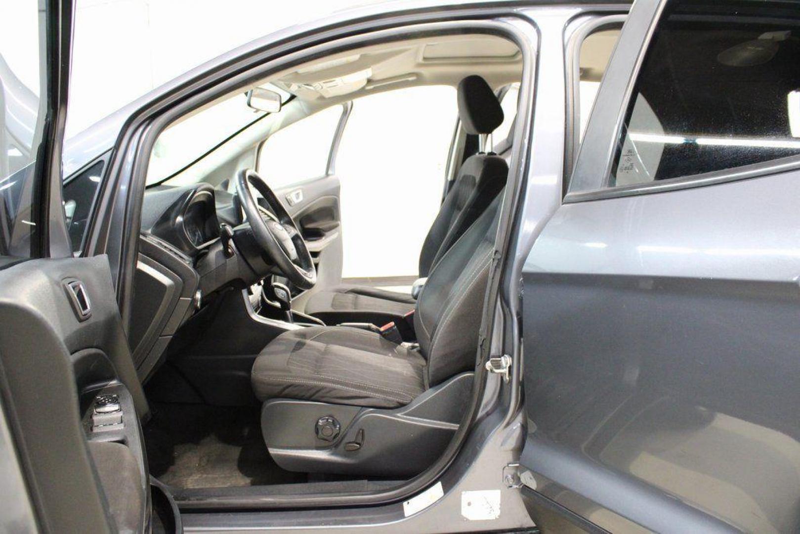 2019 Smoke /Ebony Black Ford EcoSport SE (MAJ3S2GE4KC) with an EcoBoost 1.0L I3 GTDi DOHC Turbocharged VCT engine, Automatic transmission, located at 15300 Midway Rd., Addison, TX, 75001, (972) 702-0011, 32.958321, -96.838074 - HOME OF THE NO HAGGLE PRICE - WHOLESALE PRICES TO THE PUBLIC!!<br><br>Smoke 2019 Ford EcoSport SE<br><br>27/29 City/Highway MPG<br><br><br>At Midway Auto Group, we strive to provide you with the best quality vehicles for the lowest possible price, and this 2019 Ford EcoSport is no exception,We finan - Photo#13