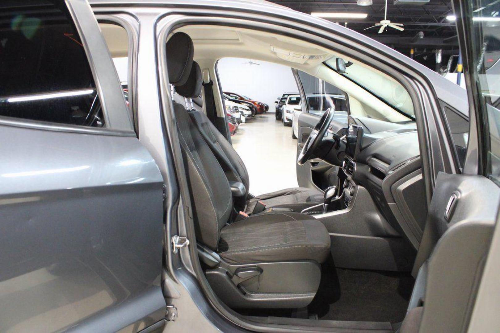 2019 Smoke /Ebony Black Ford EcoSport SE (MAJ3S2GE4KC) with an EcoBoost 1.0L I3 GTDi DOHC Turbocharged VCT engine, Automatic transmission, located at 15300 Midway Rd., Addison, TX, 75001, (972) 702-0011, 32.958321, -96.838074 - HOME OF THE NO HAGGLE PRICE - WHOLESALE PRICES TO THE PUBLIC!!<br><br>Smoke 2019 Ford EcoSport SE<br><br>27/29 City/Highway MPG<br><br><br>At Midway Auto Group, we strive to provide you with the best quality vehicles for the lowest possible price, and this 2019 Ford EcoSport is no exception,We finan - Photo#14