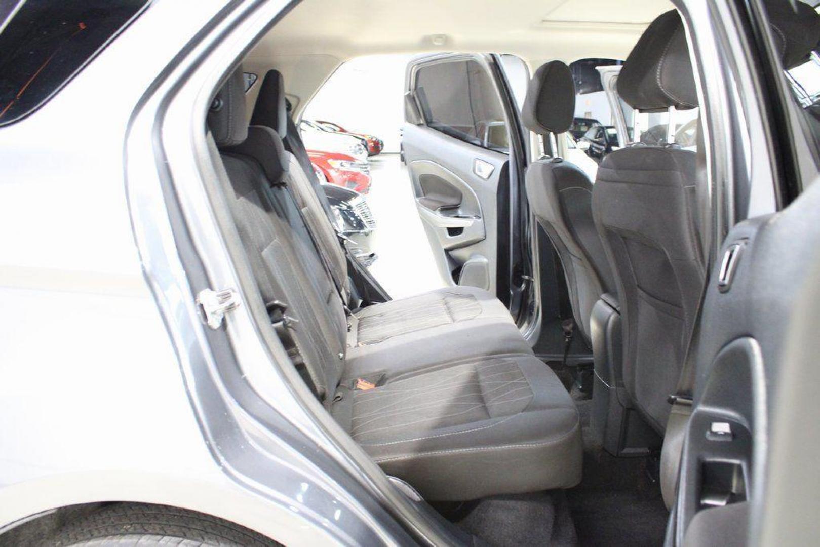 2019 Smoke /Ebony Black Ford EcoSport SE (MAJ3S2GE4KC) with an EcoBoost 1.0L I3 GTDi DOHC Turbocharged VCT engine, Automatic transmission, located at 15300 Midway Rd., Addison, TX, 75001, (972) 702-0011, 32.958321, -96.838074 - HOME OF THE NO HAGGLE PRICE - WHOLESALE PRICES TO THE PUBLIC!!<br><br>Smoke 2019 Ford EcoSport SE<br><br>27/29 City/Highway MPG<br><br><br>At Midway Auto Group, we strive to provide you with the best quality vehicles for the lowest possible price, and this 2019 Ford EcoSport is no exception,We finan - Photo#15