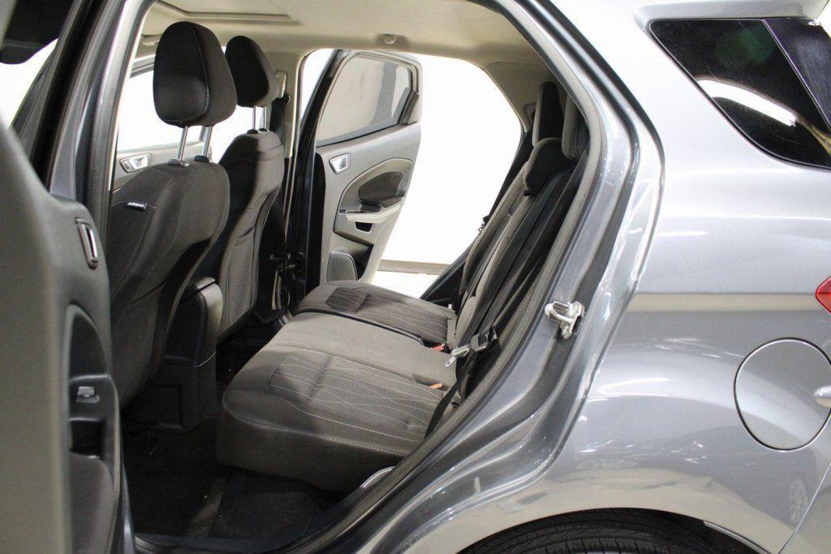 2019 Smoke /Ebony Black Ford EcoSport SE (MAJ3S2GE4KC) with an EcoBoost 1.0L I3 GTDi DOHC Turbocharged VCT engine, Automatic transmission, located at 15300 Midway Rd., Addison, TX, 75001, (972) 702-0011, 32.958321, -96.838074 - HOME OF THE NO HAGGLE PRICE - WHOLESALE PRICES TO THE PUBLIC!!<br><br>Smoke 2019 Ford EcoSport SE<br><br>27/29 City/Highway MPG<br><br><br>At Midway Auto Group, we strive to provide you with the best quality vehicles for the lowest possible price, and this 2019 Ford EcoSport is no exception,We finan - Photo#16