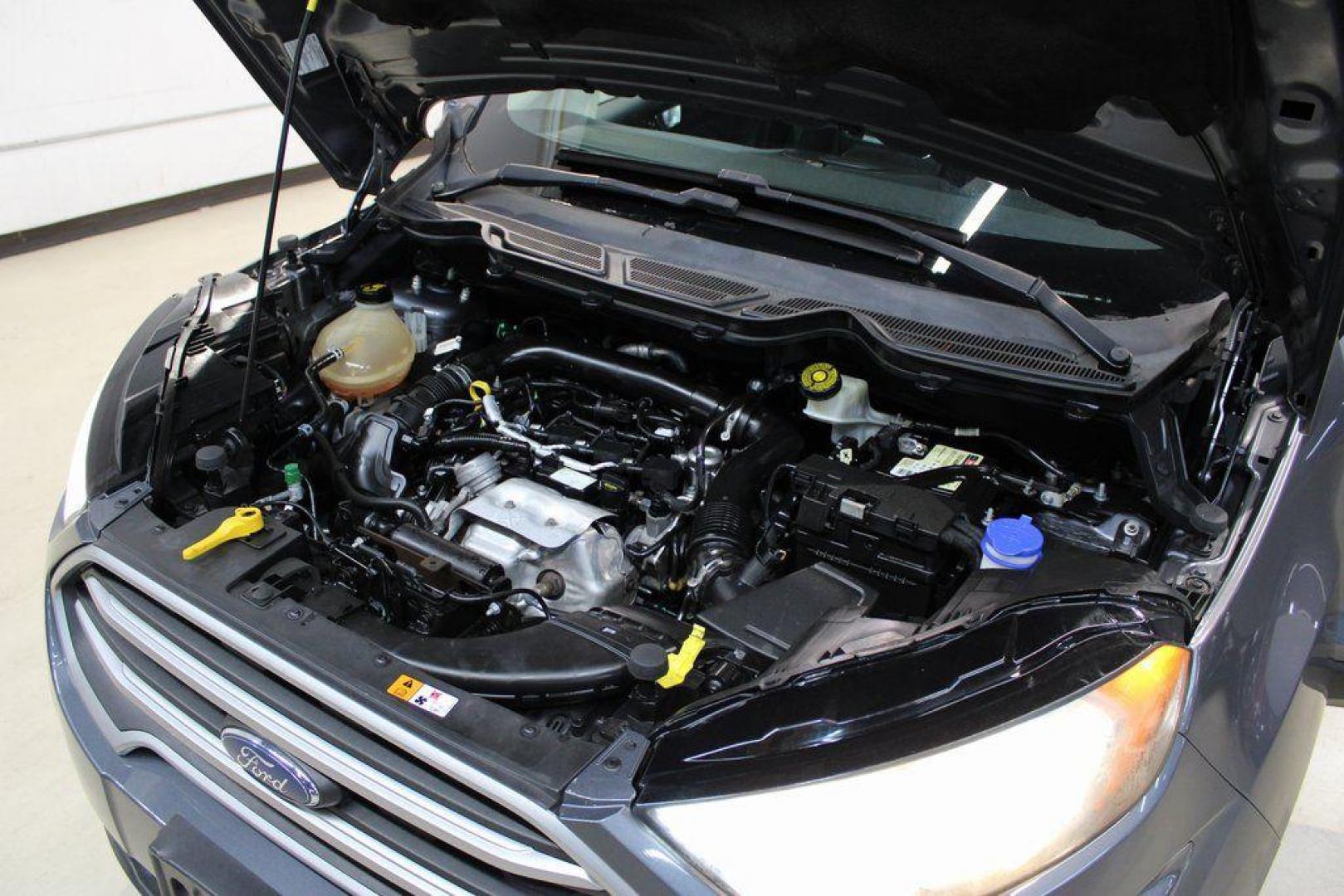 2019 Smoke /Ebony Black Ford EcoSport SE (MAJ3S2GE4KC) with an EcoBoost 1.0L I3 GTDi DOHC Turbocharged VCT engine, Automatic transmission, located at 15300 Midway Rd., Addison, TX, 75001, (972) 702-0011, 32.958321, -96.838074 - HOME OF THE NO HAGGLE PRICE - WHOLESALE PRICES TO THE PUBLIC!!<br><br>Smoke 2019 Ford EcoSport SE<br><br>27/29 City/Highway MPG<br><br><br>At Midway Auto Group, we strive to provide you with the best quality vehicles for the lowest possible price, and this 2019 Ford EcoSport is no exception,We finan - Photo#31