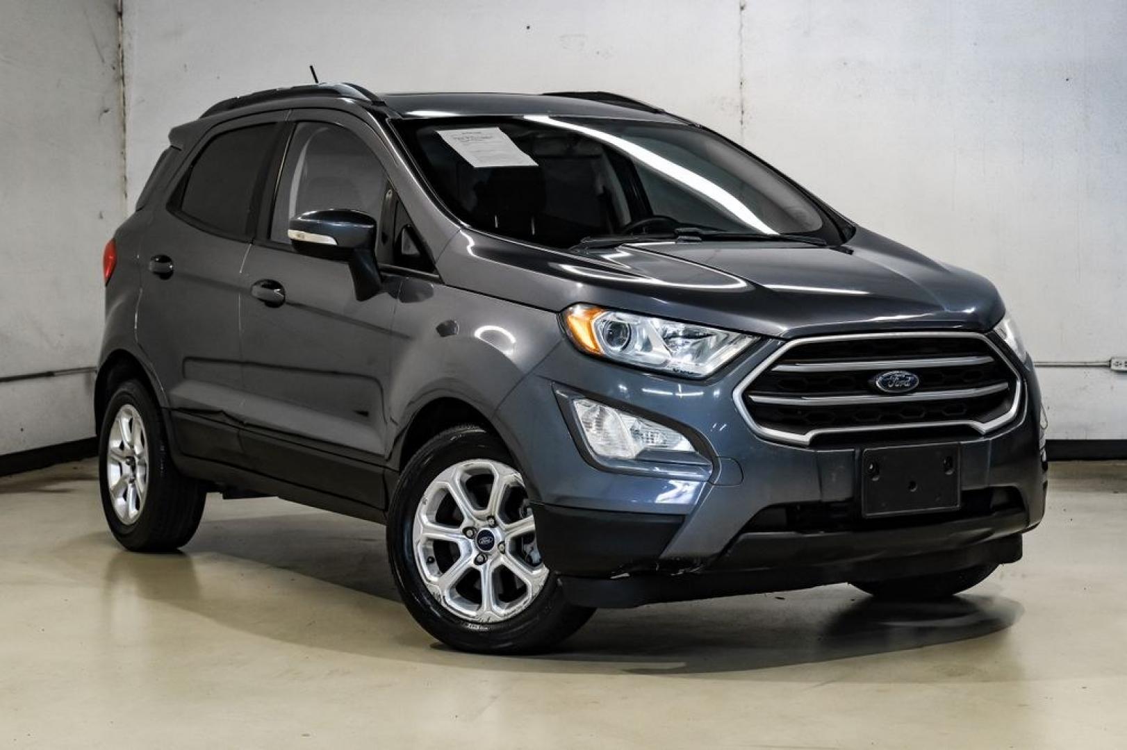 2019 Smoke Metallic /Black Ford EcoSport SE (MAJ3S2GE4KC) with an EcoBoost 1.0L I3 GTDi DOHC Turbocharged VCT engine, Automatic transmission, located at 15300 Midway Rd., Addison, TX, 75001, (972) 702-0011, 32.958321, -96.838074- Photo#8
