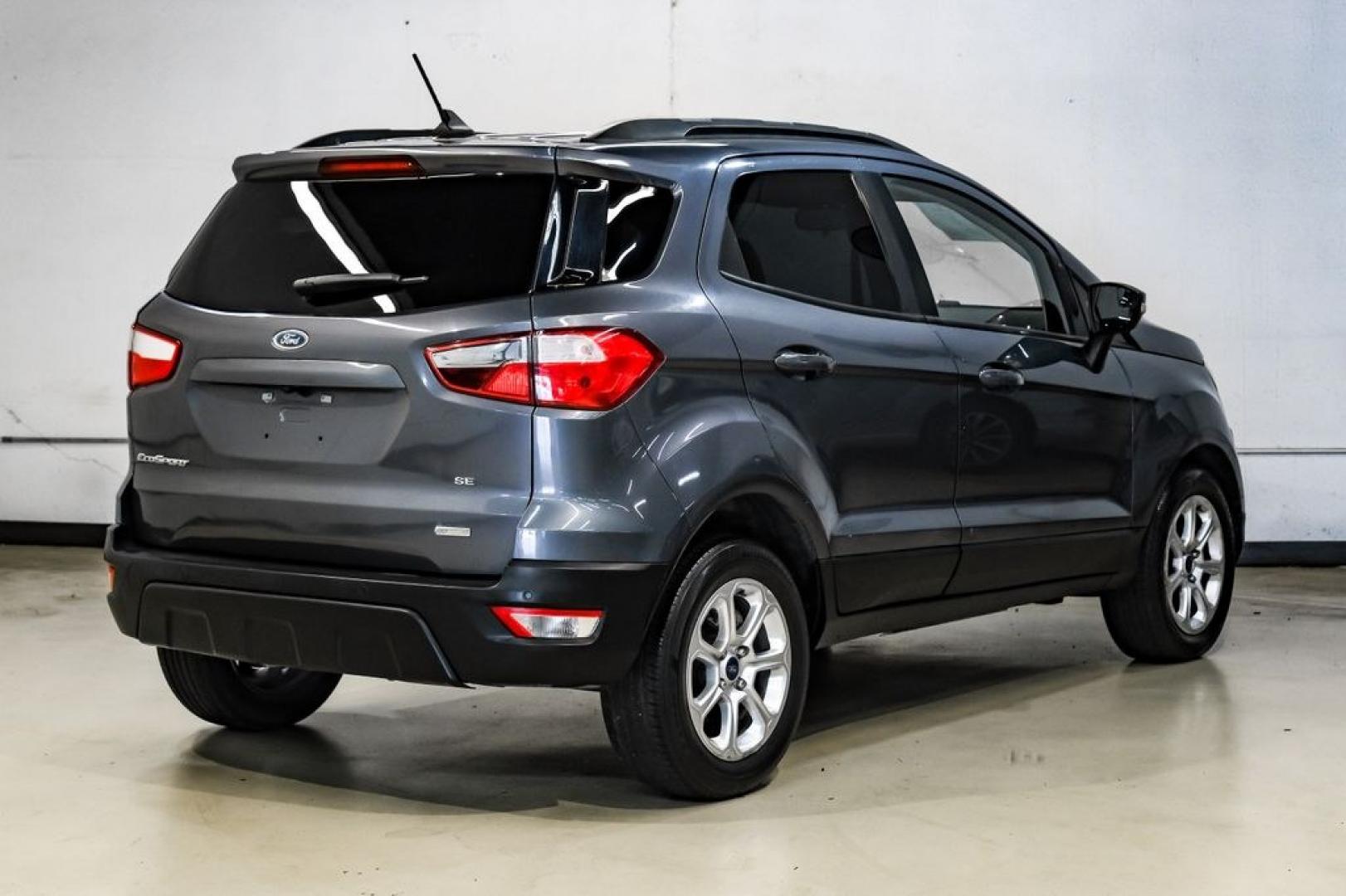 2019 Smoke Metallic /Black Ford EcoSport SE (MAJ3S2GE4KC) with an EcoBoost 1.0L I3 GTDi DOHC Turbocharged VCT engine, Automatic transmission, located at 15300 Midway Rd., Addison, TX, 75001, (972) 702-0011, 32.958321, -96.838074- Photo#10
