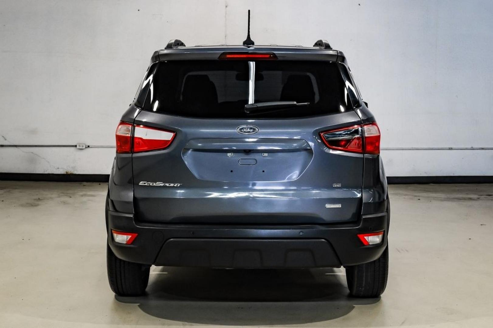 2019 Smoke Metallic /Black Ford EcoSport SE (MAJ3S2GE4KC) with an EcoBoost 1.0L I3 GTDi DOHC Turbocharged VCT engine, Automatic transmission, located at 15300 Midway Rd., Addison, TX, 75001, (972) 702-0011, 32.958321, -96.838074- Photo#11