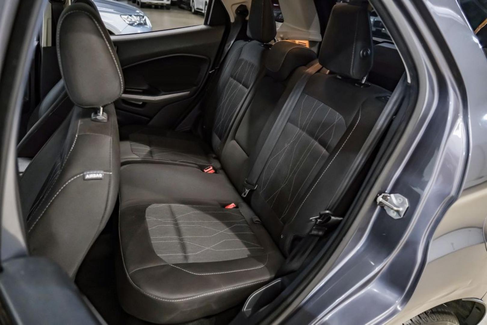 2019 Smoke Metallic /Black Ford EcoSport SE (MAJ3S2GE4KC) with an EcoBoost 1.0L I3 GTDi DOHC Turbocharged VCT engine, Automatic transmission, located at 15300 Midway Rd., Addison, TX, 75001, (972) 702-0011, 32.958321, -96.838074- Photo#38