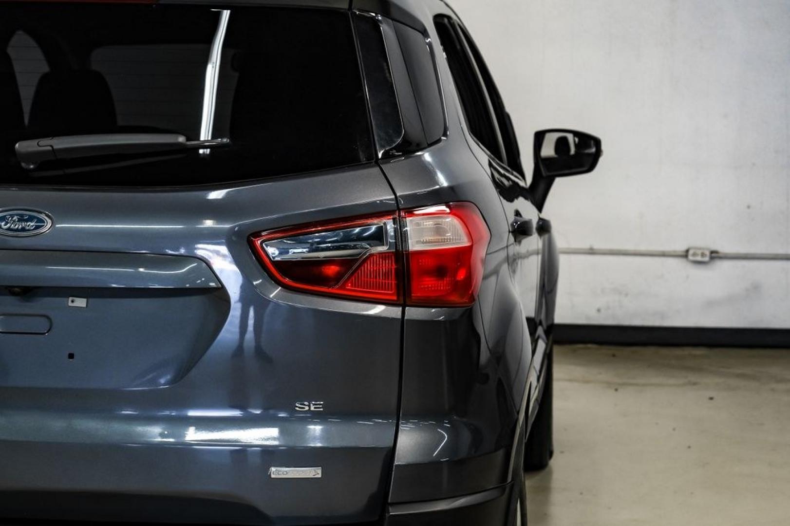 2019 Smoke Metallic /Black Ford EcoSport SE (MAJ3S2GE4KC) with an EcoBoost 1.0L I3 GTDi DOHC Turbocharged VCT engine, Automatic transmission, located at 15300 Midway Rd., Addison, TX, 75001, (972) 702-0011, 32.958321, -96.838074- Photo#47