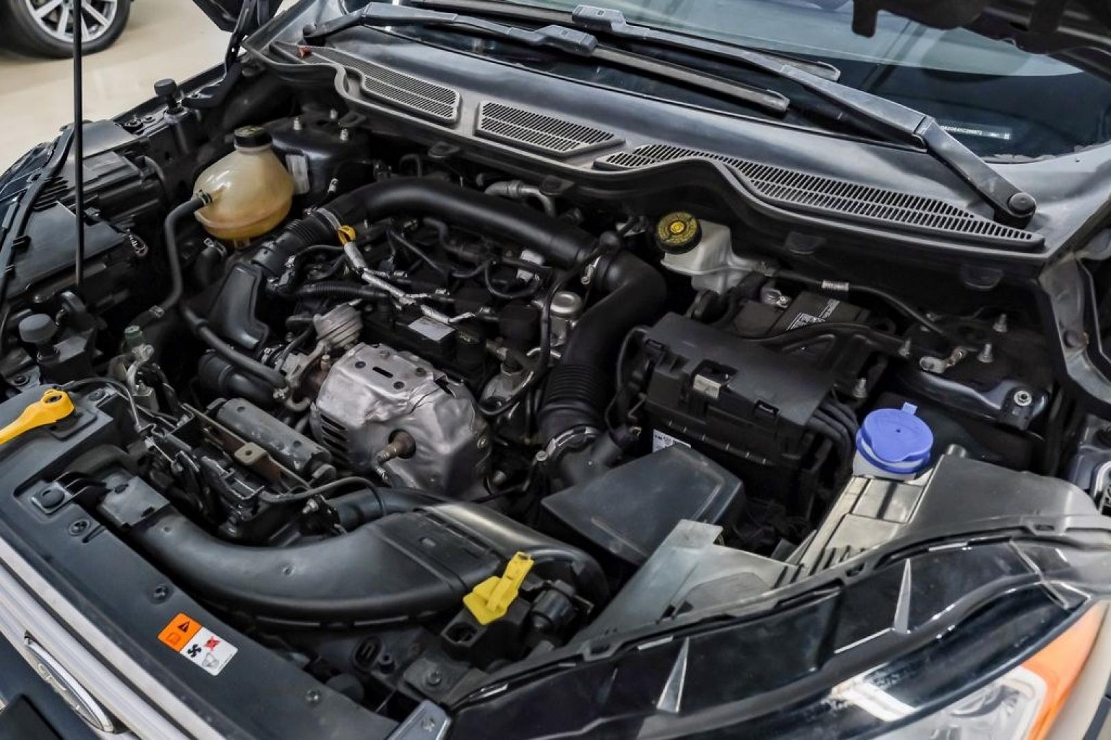 2019 Smoke Metallic /Black Ford EcoSport SE (MAJ3S2GE4KC) with an EcoBoost 1.0L I3 GTDi DOHC Turbocharged VCT engine, Automatic transmission, located at 15300 Midway Rd., Addison, TX, 75001, (972) 702-0011, 32.958321, -96.838074- Photo#48
