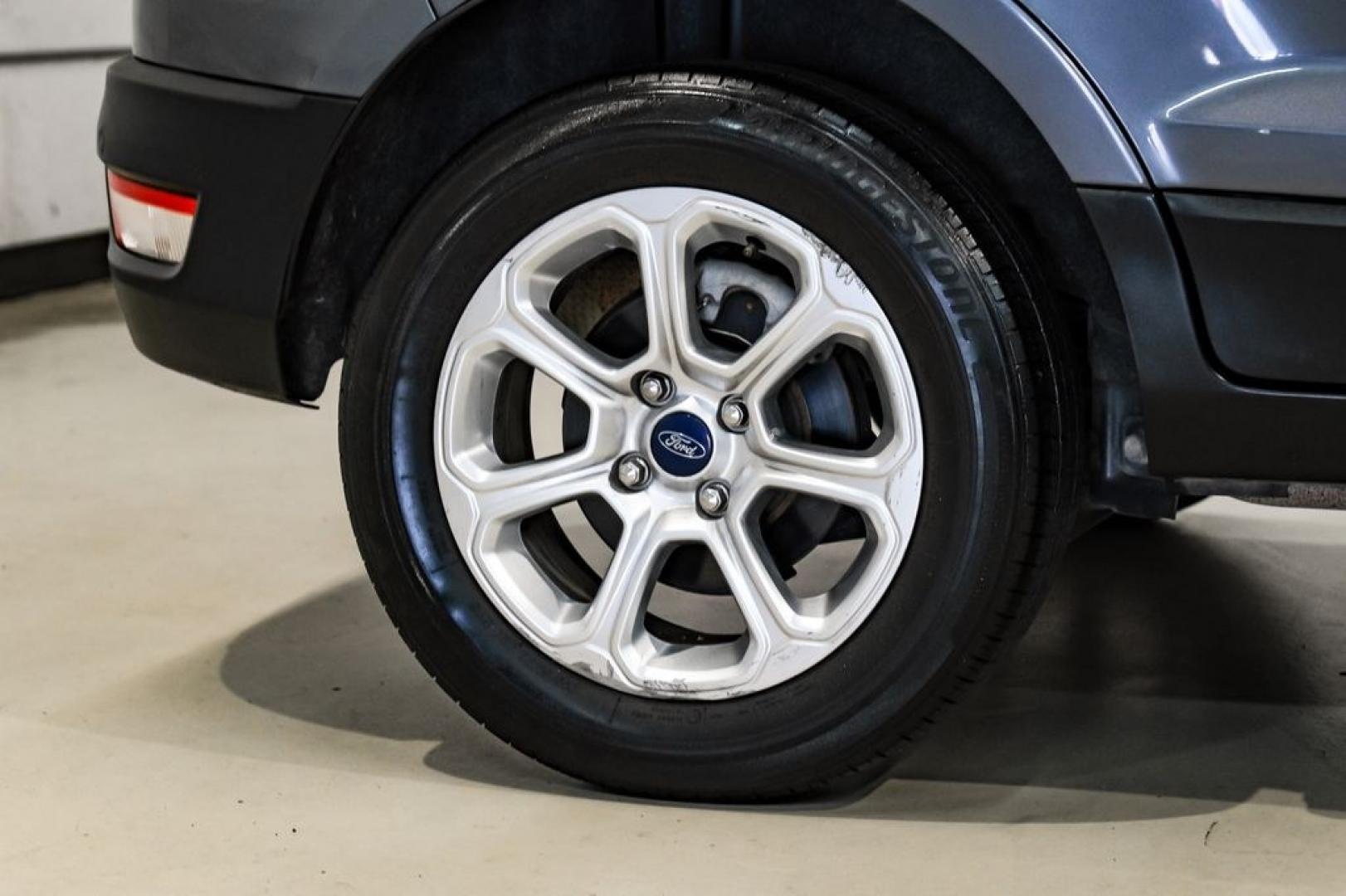 2019 Smoke Metallic /Black Ford EcoSport SE (MAJ3S2GE4KC) with an EcoBoost 1.0L I3 GTDi DOHC Turbocharged VCT engine, Automatic transmission, located at 15300 Midway Rd., Addison, TX, 75001, (972) 702-0011, 32.958321, -96.838074- Photo#51