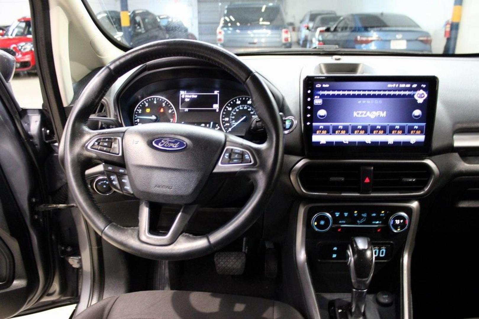 2019 Smoke /Ebony Black Ford EcoSport SE (MAJ3S2GE4KC) with an EcoBoost 1.0L I3 GTDi DOHC Turbocharged VCT engine, Automatic transmission, located at 15300 Midway Rd., Addison, TX, 75001, (972) 702-0011, 32.958321, -96.838074 - HOME OF THE NO HAGGLE PRICE - WHOLESALE PRICES TO THE PUBLIC!!<br><br>Smoke 2019 Ford EcoSport SE<br><br>27/29 City/Highway MPG<br><br><br>At Midway Auto Group, we strive to provide you with the best quality vehicles for the lowest possible price, and this 2019 Ford EcoSport is no exception,We finan - Photo#17