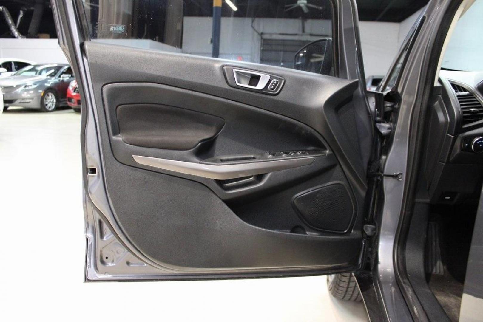 2019 Smoke /Ebony Black Ford EcoSport SE (MAJ3S2GE4KC) with an EcoBoost 1.0L I3 GTDi DOHC Turbocharged VCT engine, Automatic transmission, located at 15300 Midway Rd., Addison, TX, 75001, (972) 702-0011, 32.958321, -96.838074 - HOME OF THE NO HAGGLE PRICE - WHOLESALE PRICES TO THE PUBLIC!!<br><br>Smoke 2019 Ford EcoSport SE<br><br>27/29 City/Highway MPG<br><br><br>At Midway Auto Group, we strive to provide you with the best quality vehicles for the lowest possible price, and this 2019 Ford EcoSport is no exception,We finan - Photo#27