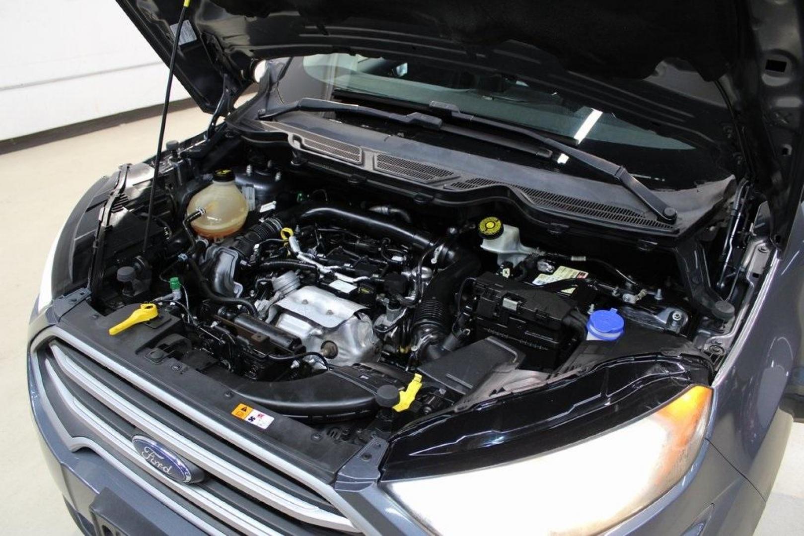 2019 Smoke /Ebony Black Ford EcoSport SE (MAJ3S2GE4KC) with an EcoBoost 1.0L I3 GTDi DOHC Turbocharged VCT engine, Automatic transmission, located at 15300 Midway Rd., Addison, TX, 75001, (972) 702-0011, 32.958321, -96.838074 - HOME OF THE NO HAGGLE PRICE - WHOLESALE PRICES TO THE PUBLIC!!<br><br>Smoke 2019 Ford EcoSport SE<br><br>27/29 City/Highway MPG<br><br><br>At Midway Auto Group, we strive to provide you with the best quality vehicles for the lowest possible price, and this 2019 Ford EcoSport is no exception,We finan - Photo#31