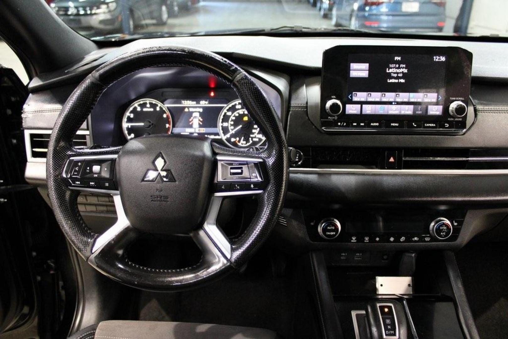 2022 Black /Black Mitsubishi Outlander SE (JA4J4UA88NZ) with an 2.5L 4-Cylinder DOHC engine, CVT transmission, located at 15300 Midway Rd., Addison, TX, 75001, (972) 702-0011, 32.958321, -96.838074 - Introducing the 2022 Mitsubishi Outlander Black Edition, now available at Midway Auto Group in Addison, Texas. This sleek and versatile SUV combines modern design with advanced features, offering a comfortable and connected driving experience.<br><br>Key Features:<br><br>Mileage: 127,641 miles<br><b - Photo#17