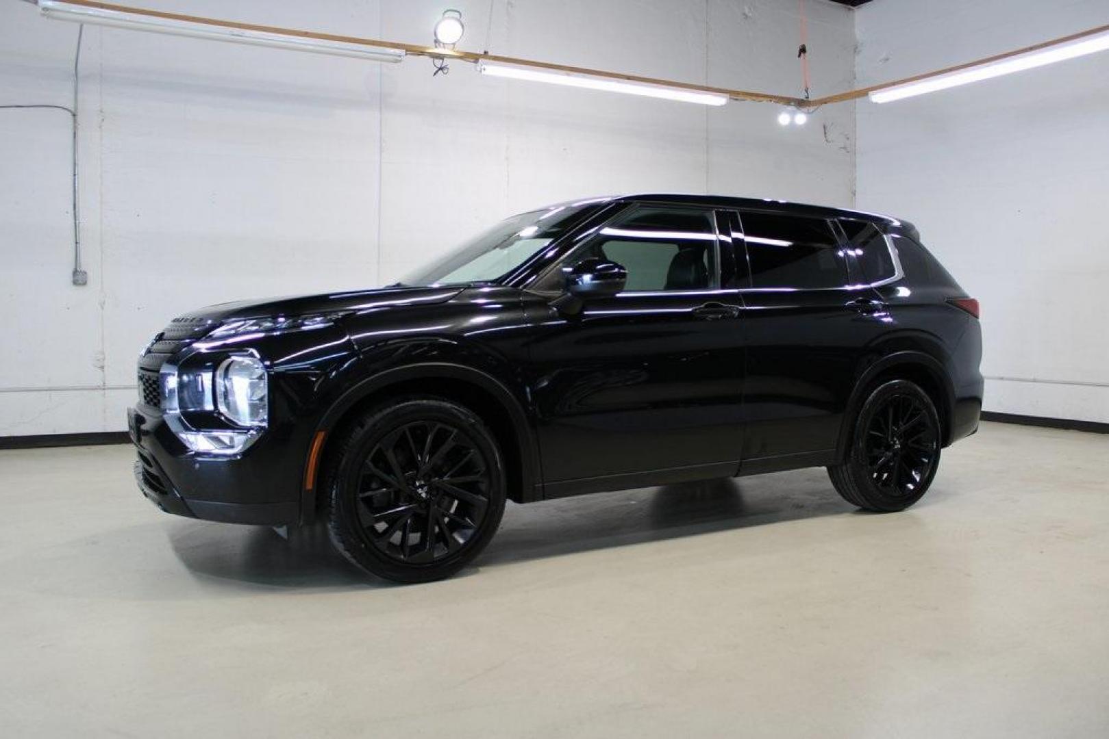 2022 Black /Black Mitsubishi Outlander SE (JA4J4UA88NZ) with an 2.5L 4-Cylinder DOHC engine, CVT transmission, located at 15300 Midway Rd., Addison, TX, 75001, (972) 702-0011, 32.958321, -96.838074 - Introducing the 2022 Mitsubishi Outlander Black Edition, now available at Midway Auto Group in Addison, Texas. This sleek and versatile SUV combines modern design with advanced features, offering a comfortable and connected driving experience.<br><br>Key Features:<br><br>Mileage: 127,641 miles<br><b - Photo#4