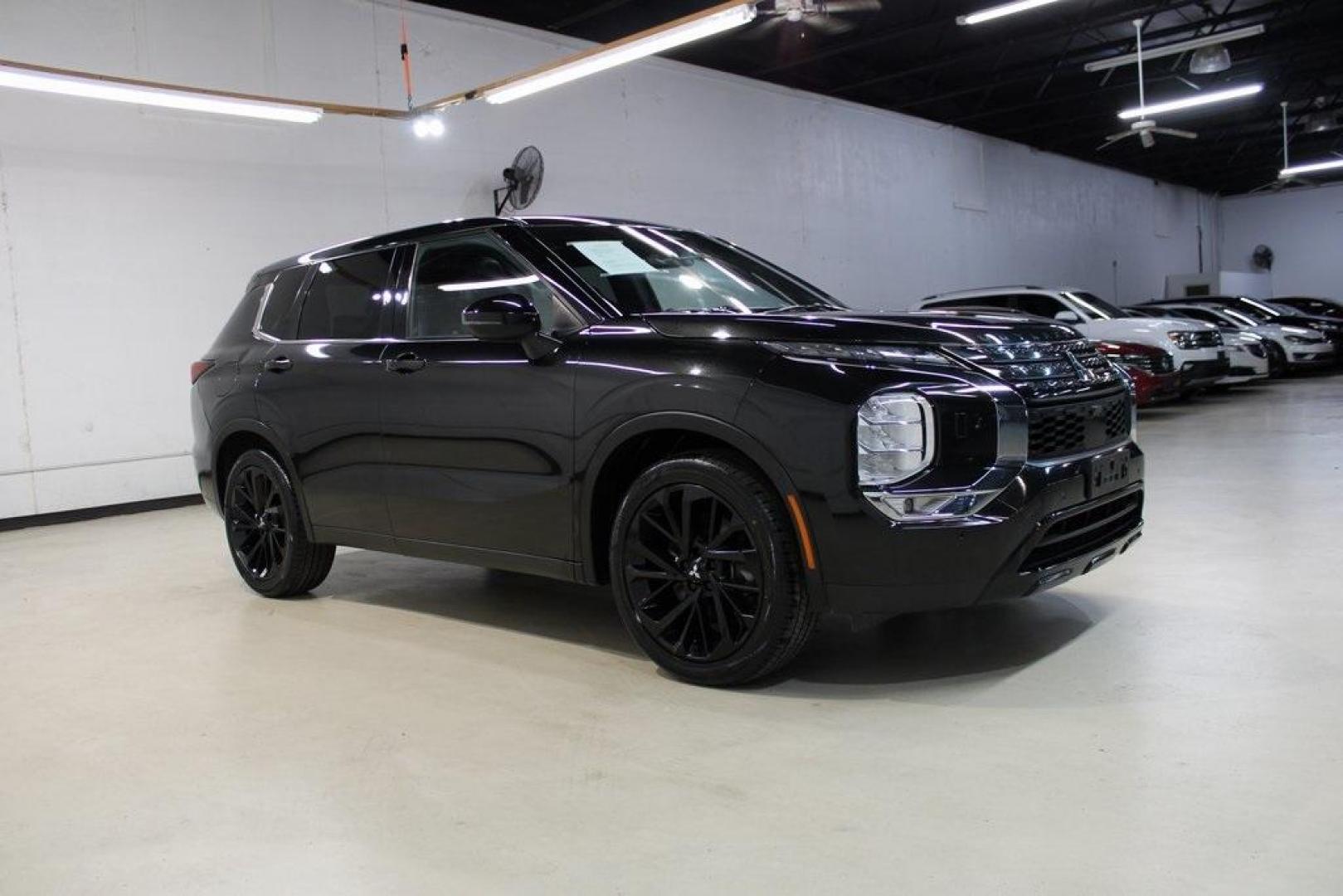 2022 Black /Black Mitsubishi Outlander SE (JA4J4UA88NZ) with an 2.5L 4-Cylinder DOHC engine, CVT transmission, located at 15300 Midway Rd., Addison, TX, 75001, (972) 702-0011, 32.958321, -96.838074 - Introducing the 2022 Mitsubishi Outlander Black Edition, now available at Midway Auto Group in Addison, Texas. This sleek and versatile SUV combines modern design with advanced features, offering a comfortable and connected driving experience.<br><br>Key Features:<br><br>Mileage: 127,641 miles<br><b - Photo#6